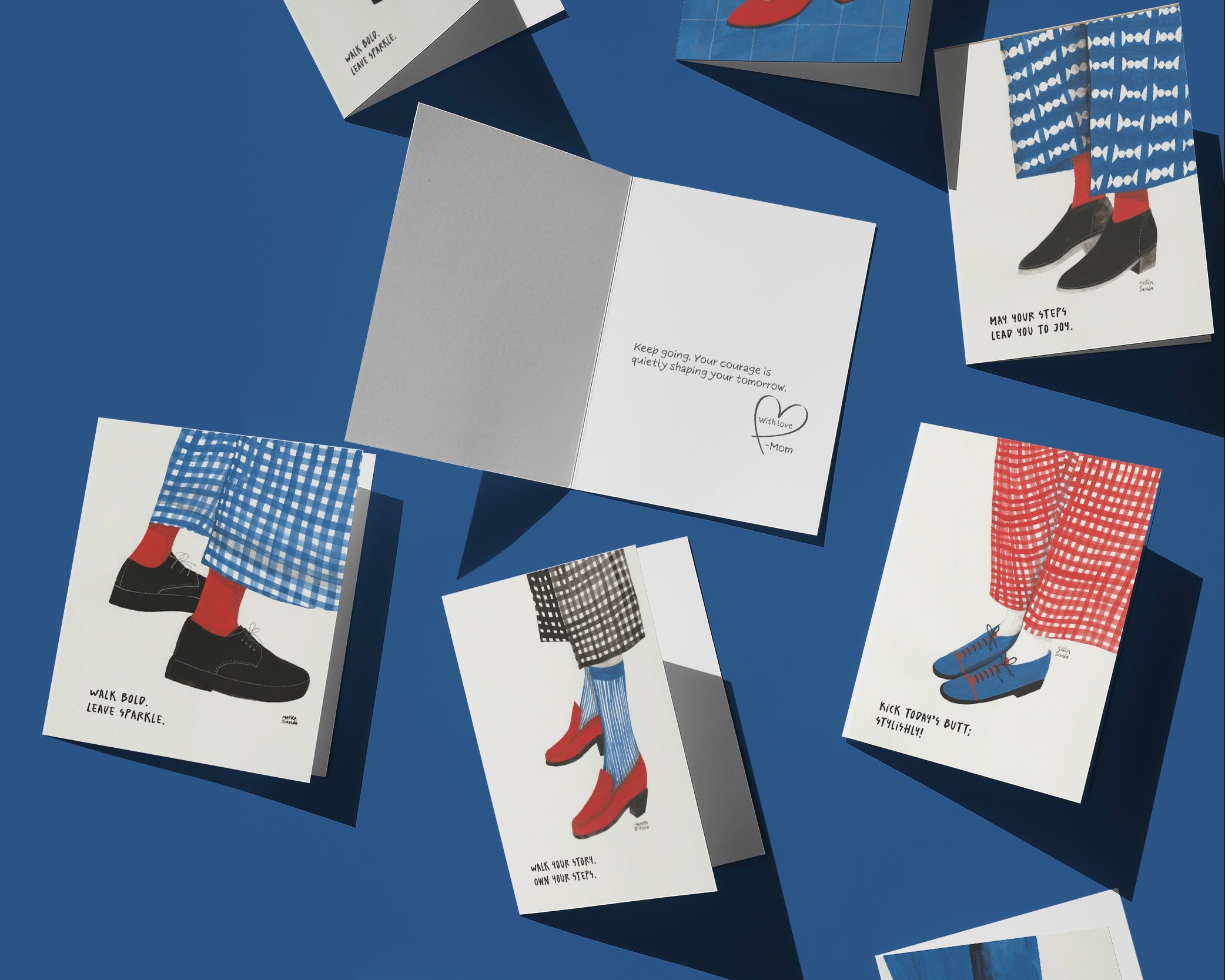 Greeting cards with shoe designs on a blue background